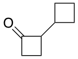 2-cyclobutylcyclobutan-1-one